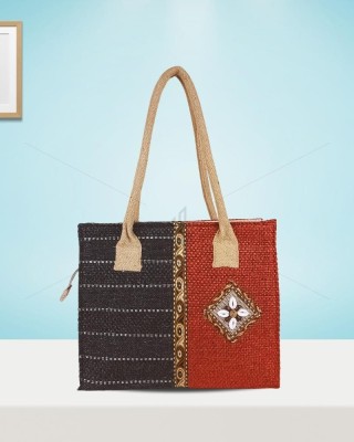 Hand Bag - A winsome double shaded jute handbag with an endearing patch work of cowrie shells (12 x 4 x 10 inches)