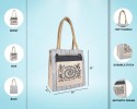 Hand Bag - A stylish jute handbag with a pouch in the front with striking warli prints with zipper (11 x 5 x 12 inches)